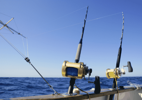 heavy duty rods and reels attached to a boat