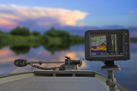 Fishing boat with fish finder, echolot, sonar and structure scanner aboard